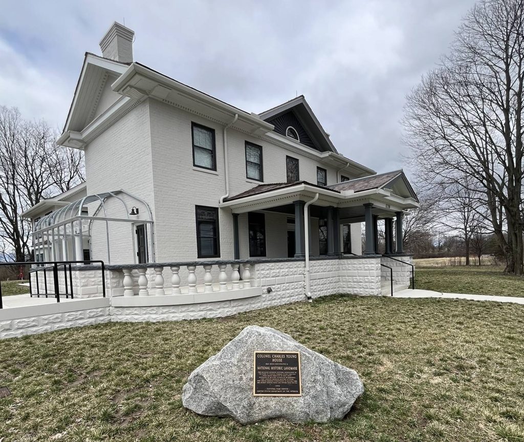 External view of Charles Young Buffalo Soldiers National Monument with commemorative stone marker on front lawn