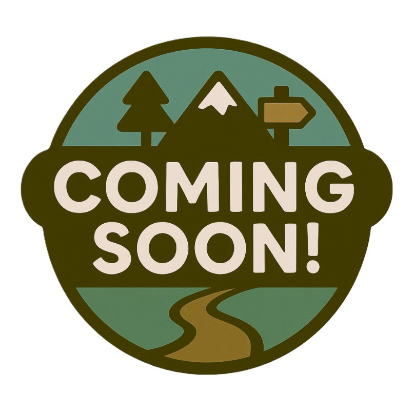 A nature-themed badge with the words ‘Coming Soon!’ in bold, friendly lettering. The design features earthy tones and subtle icons like a tree and mountain, evoking a state park or outdoor adventure theme.