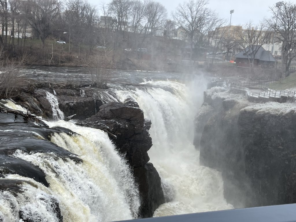 Paterson Great Falls thundering over basalt cliffs on the Passaic River at Paterson Great Falls National Historical Park in New Jersey