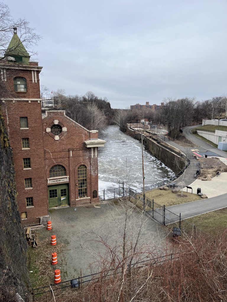 Historic S.U.M. hydropower building along the Passaic River at Paterson Great Falls National Historical Park in New Jersey