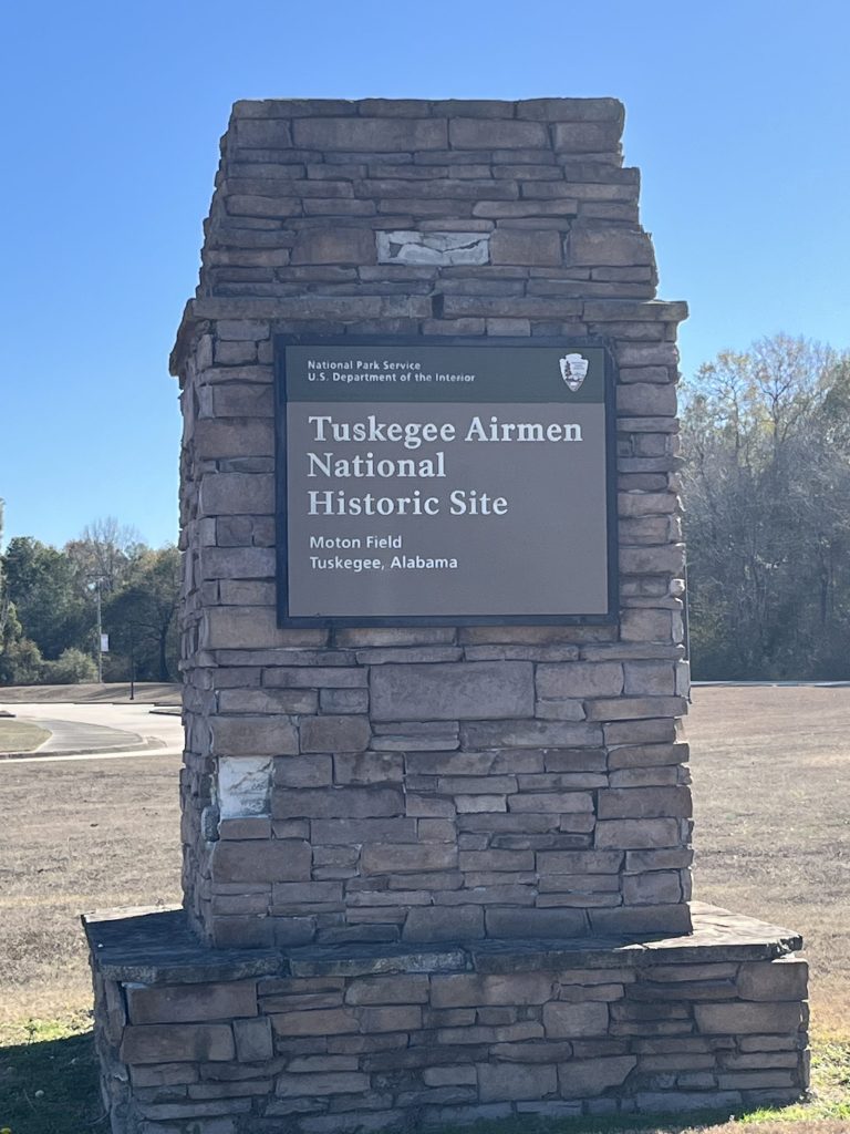 Stone wall entrance sign for Tuskegee Airmen National Historic Site, Moton Field, Tuskegee Alabama