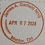 James A. Garfield NHS passport cancellation stamp in orange ink