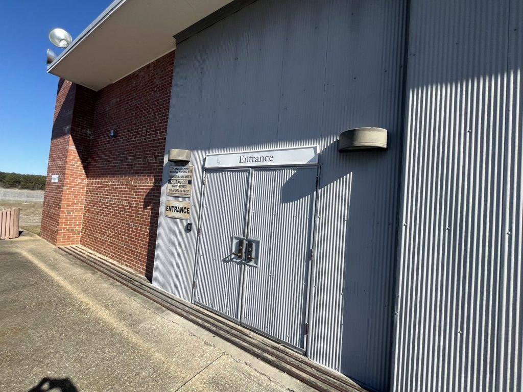 ntrance doors to Hangar 1 with Entrance signage at Tuskegee Airmen National Historic Site