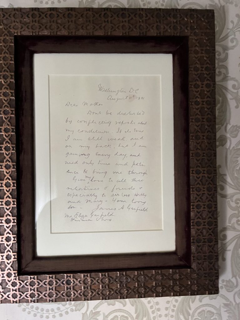ramed letter written by James A. Garfield on display inside Lawnfield at Garfield NHS