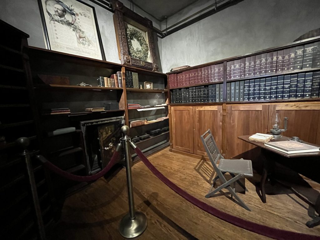 Corner office with desk and bookshelves inside Lawnfield at James A. Garfield National Historic Site
