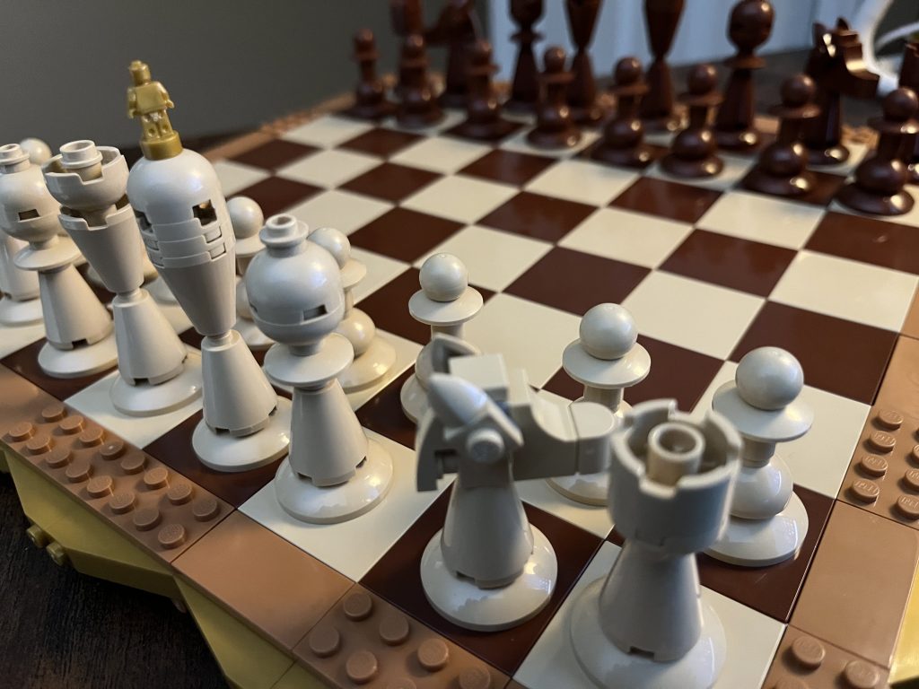 chess board with lego pieces white and brown boxes