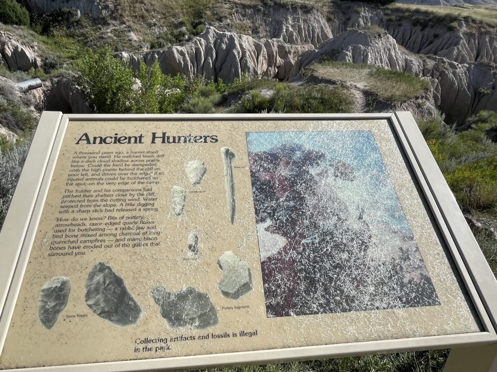 Ancient Hunters interpretive sign at Badlands National Park showing stone tools and artifacts