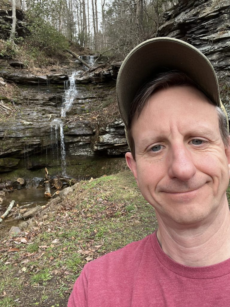 new river gorge waterfall selfie on trail