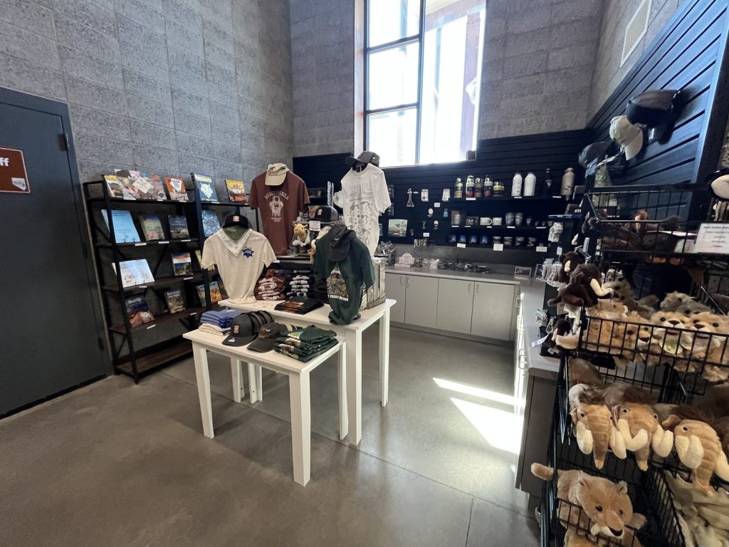 Gift shop inside Ice Age Fossils State Park visitor center with Ice Age themed merchandise, books, and stuffed animals